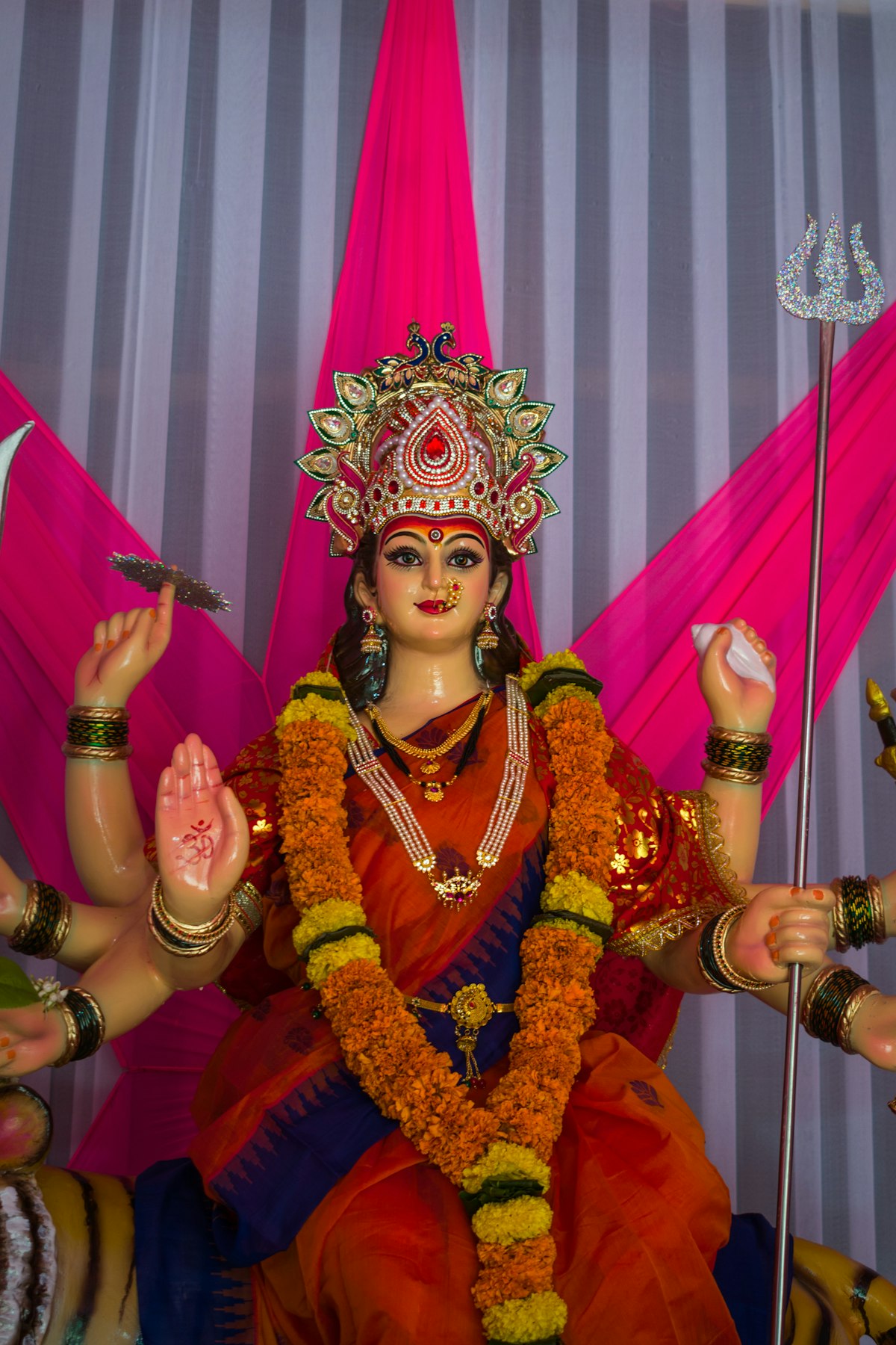Durga Devi idol adorned with marigold garlands — Navratri 2026